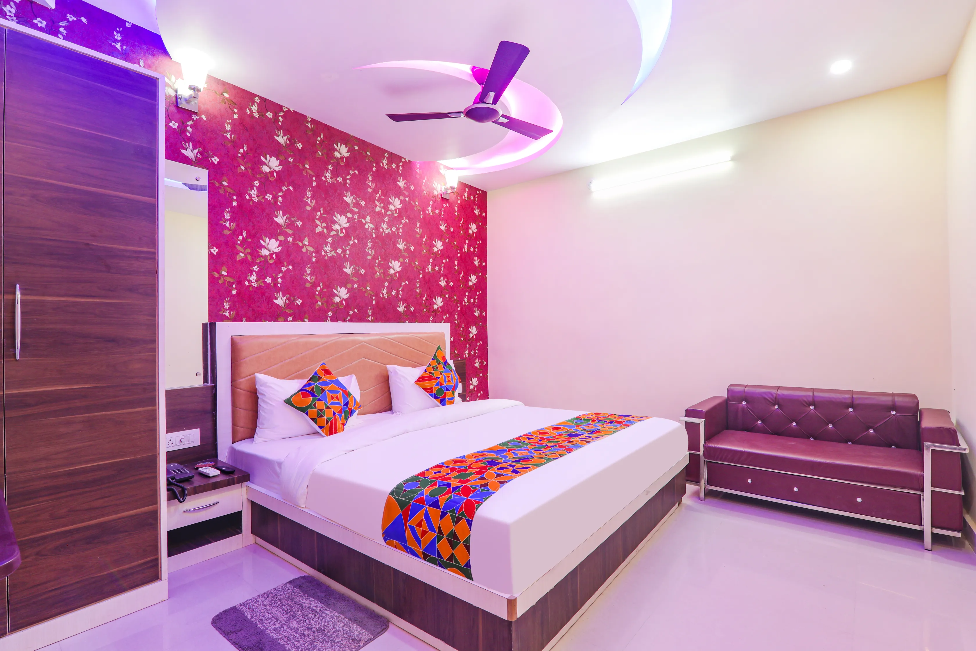 Executive room with seating area at Hotel Nikunj